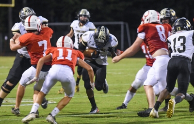 Spiders run past Mustangs