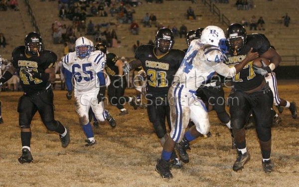 Norman Young advances a fumble recovery. 