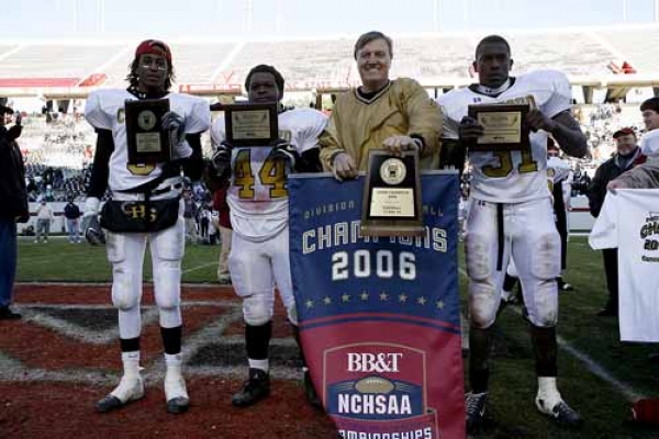 Coach Smith with Dee Bost, Mike Moore, and Calvin Hillie